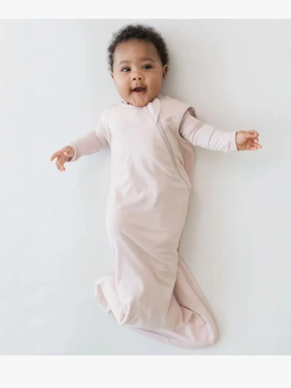 Kyte Baby Blush colored 1.0 Tog sleep sack